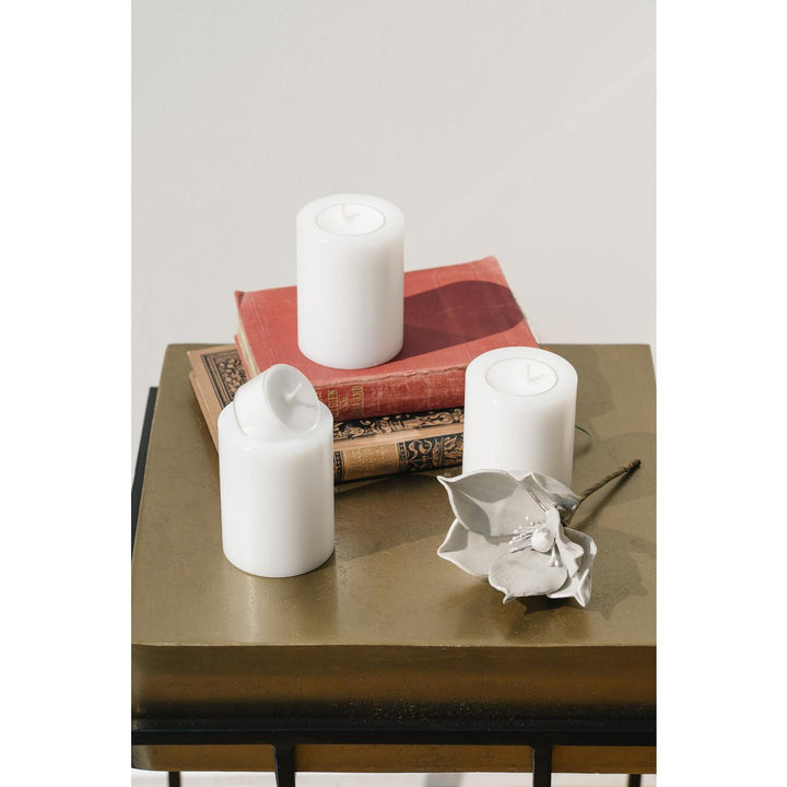 Set de 4 bougies permanentes Cornelius (hauteur 8 cm, Ø 6 cm), blanches, photophores résistants