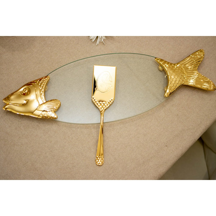 Plat poisson avec pelle dorée