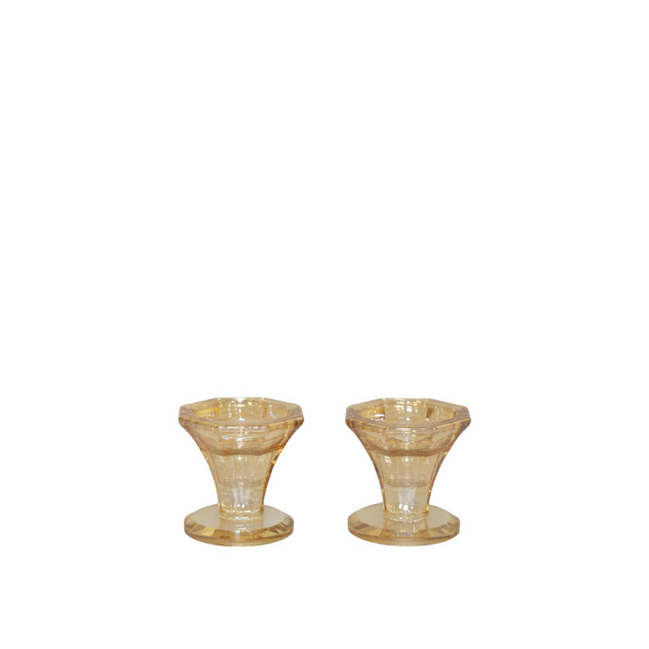 lot deux bougeoirs en verre ambre